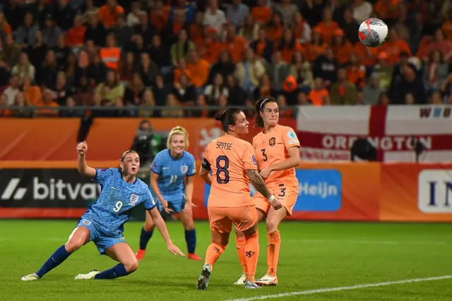 Russo curves the ball beyond the Dutch defence.