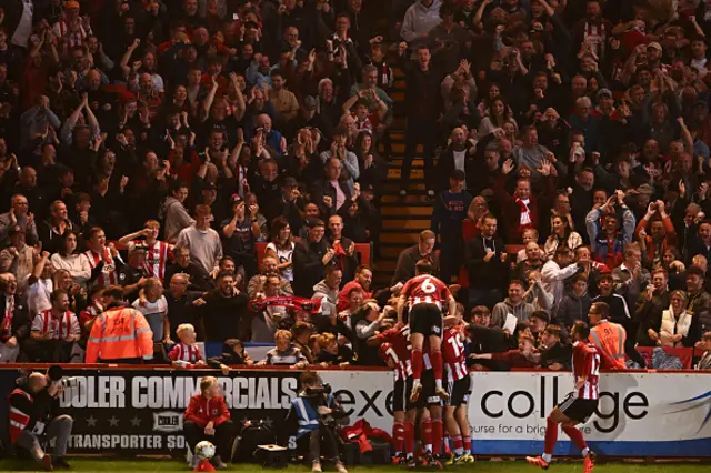 Exeter celebrate their only goal of the evening