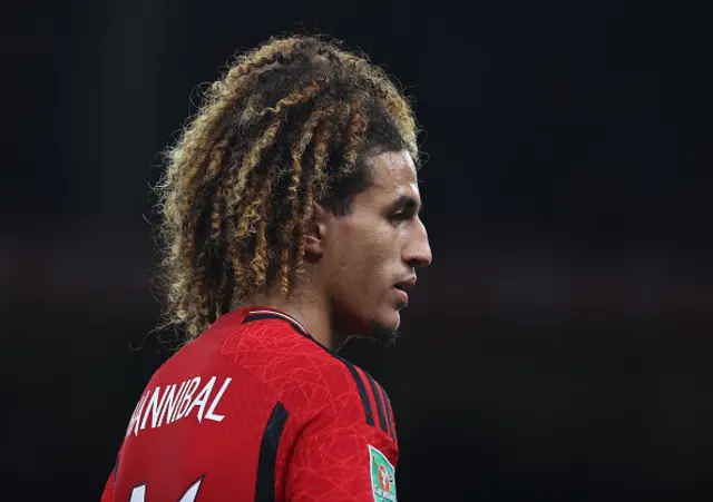 Hannibal Mejbri of Manchester United in action, looking on