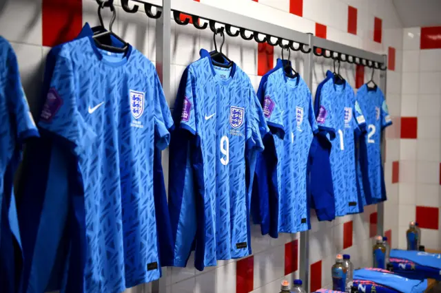 England shirts hang ready in the dressing room pre-match.