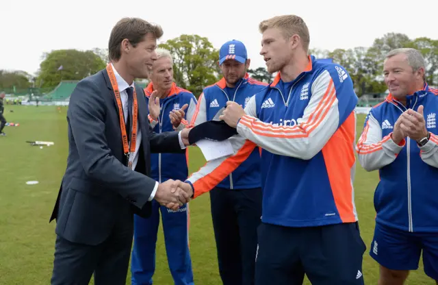 England's David Willey is presented with his one-day international cap ahead of his debut against Ireland in 2015