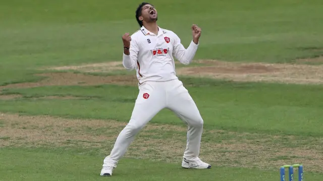 Umesh Yadav celebrates taking wicket for Essex