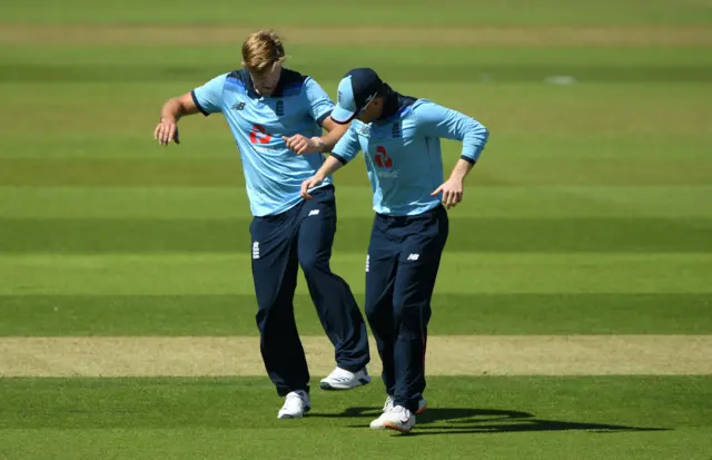 England's David Willey celebrates a wicket with Eoin Morgan during the first ODI against Ireland in 2020