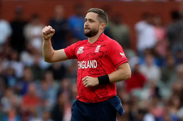 England's Chris Woakes celebrates taking a wicket during the 2022 T20 World Cup