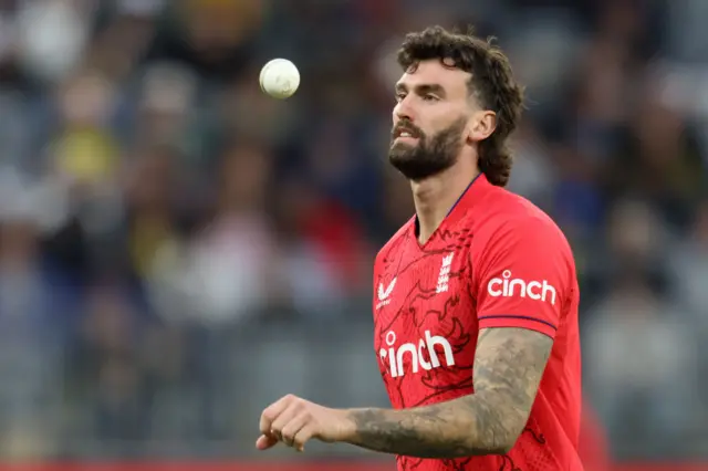 England's Reece Topley prepares to bowl during a T20 match between England and Australia