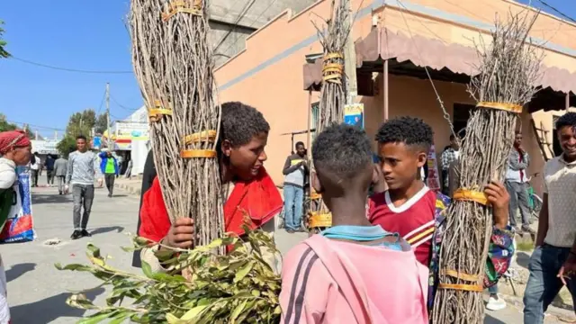 Children in Agame selling cross wood, Ethiopia