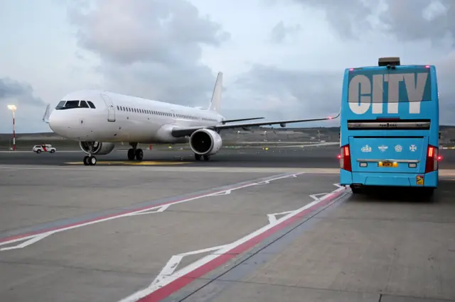 Manchester City bus and plane