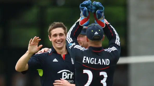 England's Chris Woakes celebrates a wicket during an ODI against Australia in 2011