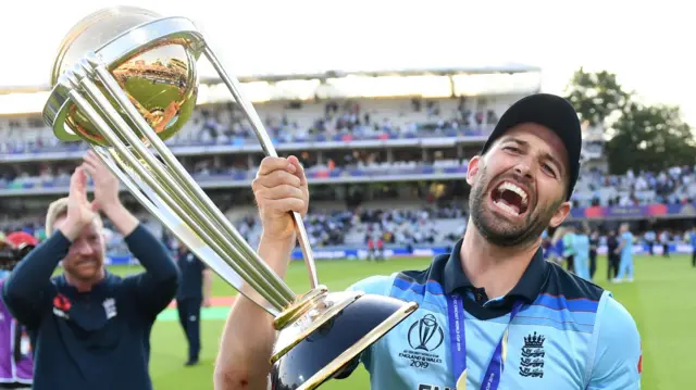 England's Mark Wood celebrates winning the 2019 World Cup against New Zealand