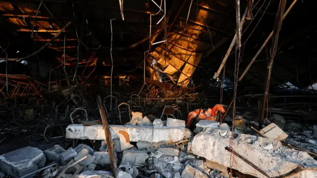 Rubble strewn across the floor of the venue