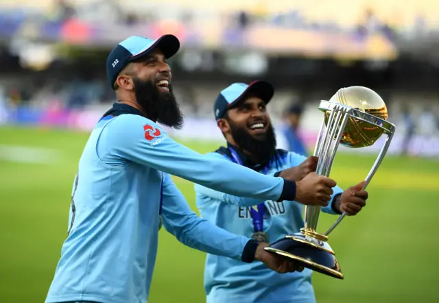 England's Adil Rashid (right) and Moeen Ali (left) celebrate winning the 2019 Cricket World Cup