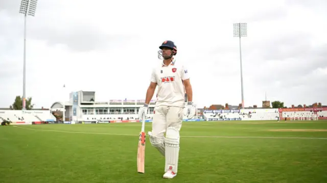 Alastair Cook walks off after being dismissed