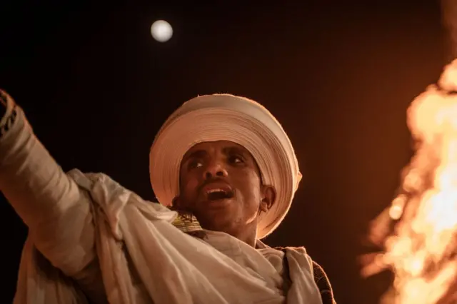 An Orthodox deacon sings during the celebrations of the Ethiopian Orthodox holiday of Meskel in Addis Ababa on September 27, 2023