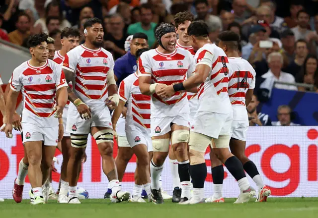 Pieter Labuschagne of Japan celebrates scoring the team's first try