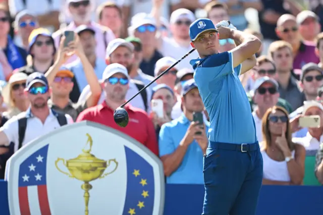 Ludvig Aberg tees off during a Ryder Cup practice round