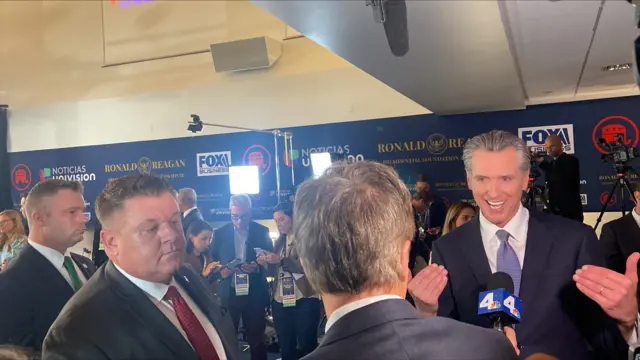 California governor Gavin Newsom speaks to a gaggle of press at the Republican debate