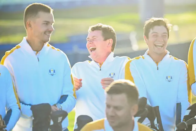 Robert MacIntyre laughs after sharing a joke with his European Ryder Cup team-mates