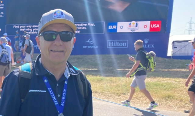 Martin chats by the ninth hole