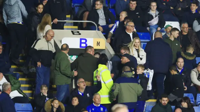 Sheffield Wednesday fans head for the exits