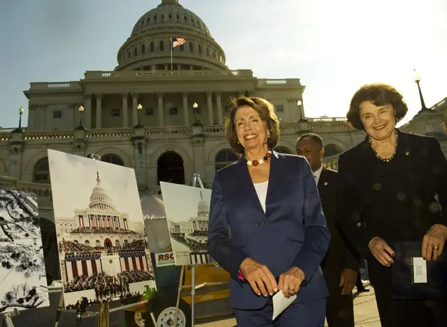 Members of the Joint Congressional Committee on Inaugural Ceremonies Sen. Dianne Feinstein, D-Calif., and House Speaker Nancy Pelosi, D-Calif., after hammering the first nails for the platform to be built for the 2009 inauguration ceremony,