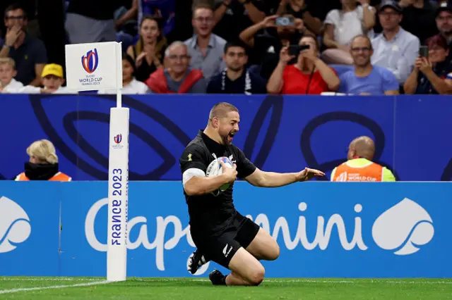 Dane Coles of New Zealand scores his team's tenth try