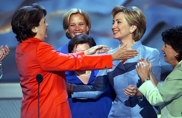 US First Lady and New York US Senate candidate Hillary Rodham Clinton (2nd R) is greeted by US Senator for California Dianne Feinstein (L) at the Democratic National Convention 14 August 2000