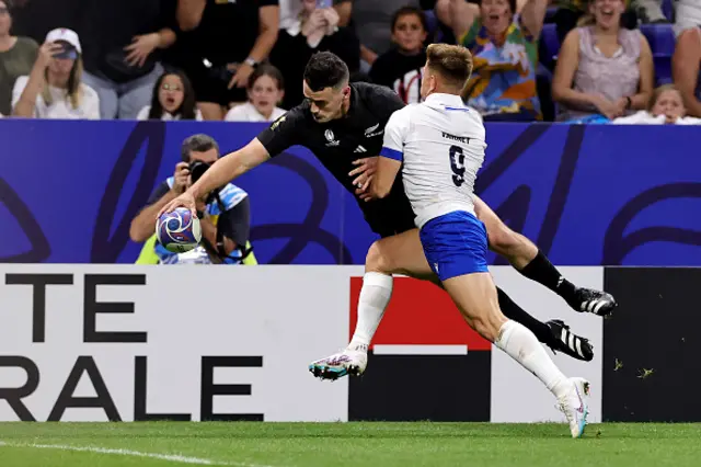 Will Jordan of New Zealand scores his team's first try