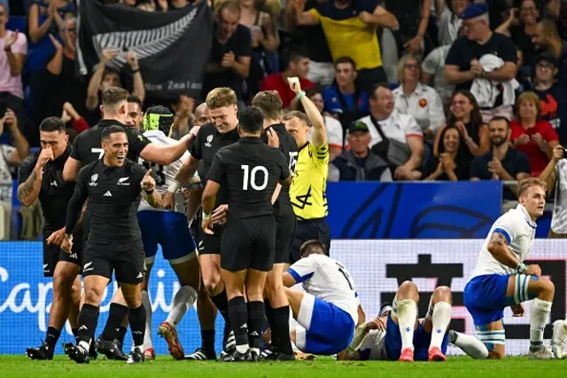 New Zealand's scrum-half Aaron Smith celebrates scoring