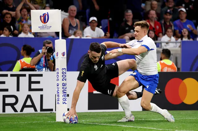 Will Jordan of New Zealand scores his team's first try