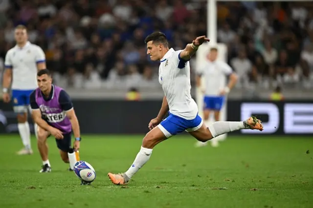 Italy's full-back Tommaso Allan converts a penalty