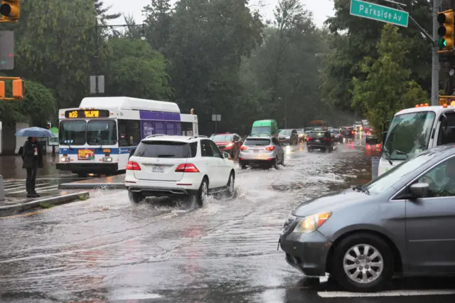 Cars drive through flooding to Brooklyn