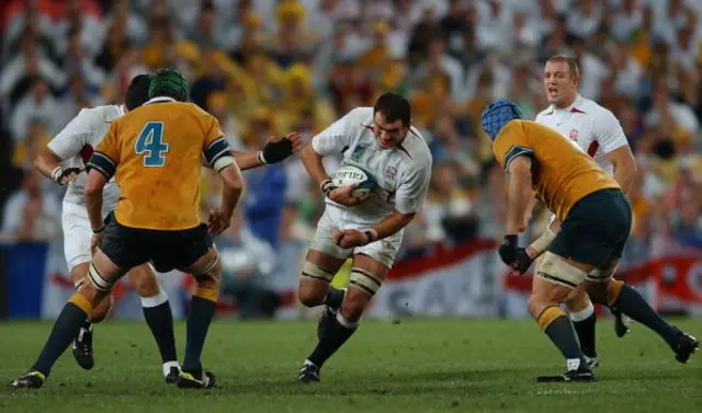 England's captain Martin Johnson breaks the Australian defence