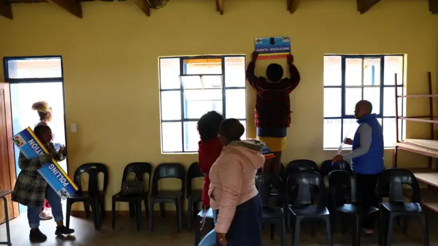 Workers prepare a polling station ahead of Eswatini's parliamentary elections in Mbabane, Eswatini, September 28, 2023