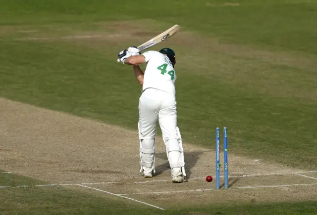 Will Davis is bowled