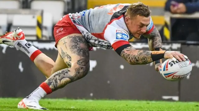 Josh Charnley dives to the line for Leigh Leopards