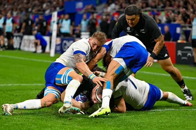 New Zealand's lock Brodie Retallick scores a try