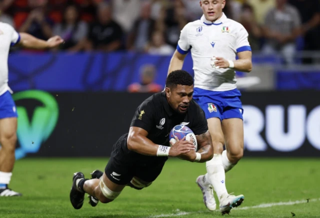 New Zealand's Ardie Savea scores their fourth try