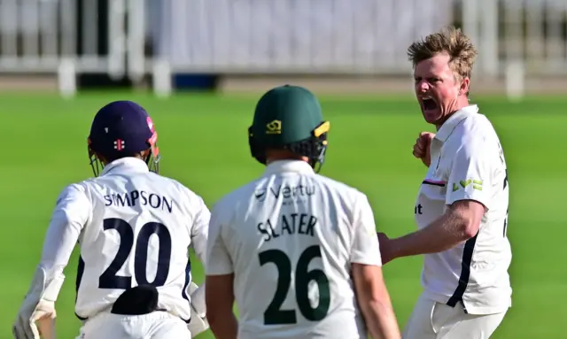 Sam Robson (Middx) celebrates a wicket