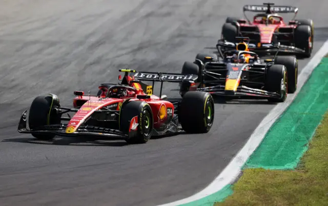 carlos sainz leading max verstappen