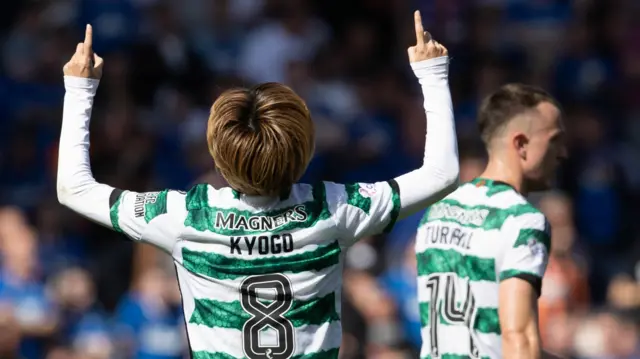 Kyogo celebrates the opening goal at Ibrox