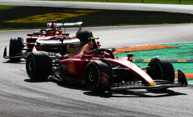 carlos sainz leading charles leclerc