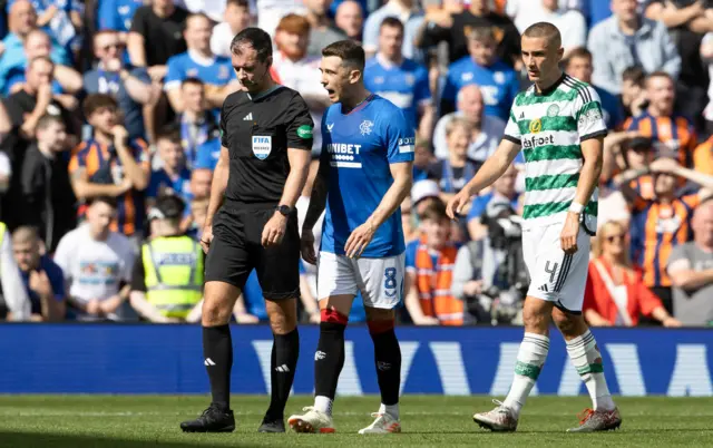 Ryan Jack giving referee Don Robertson an earful