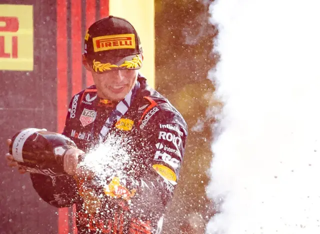 Max Verstappen celebrates with champagne after his win at Monza