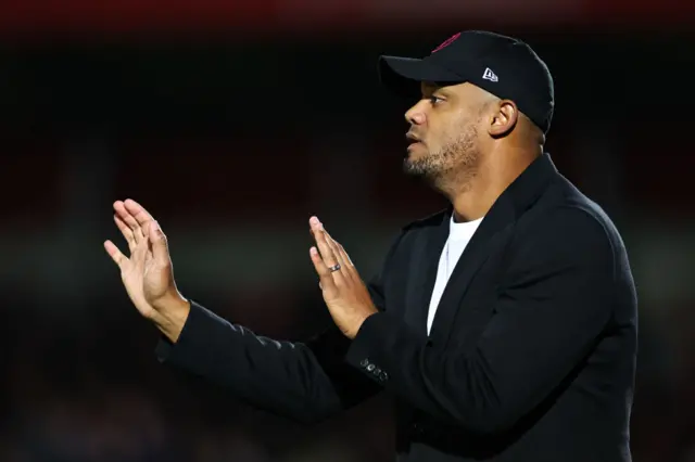 Vincent Kompany gives instructions from the touchline.