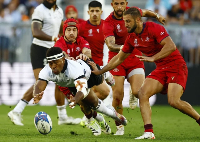 Fiji's Vinaya Habosi in action diving for the fumbled ball