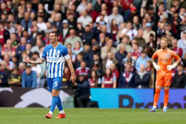 Lewis Dunk looks dejected