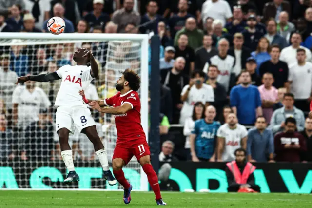 ves Bissouma fights for the ball Mohamed Salah