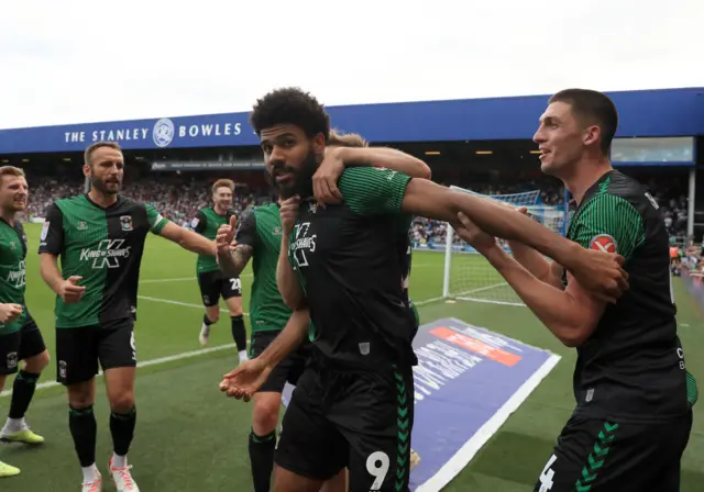 Ellis Simms celebrates Coventry's third goal at QPR