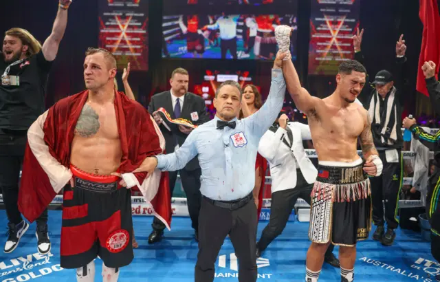 Jai Opetaia has his arm raised after beating Mairis Briedis