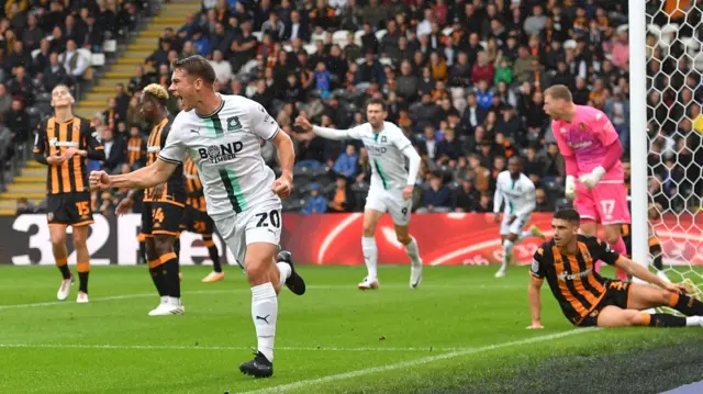 Adam Randall celebrates scoring for Plymouth at Hull